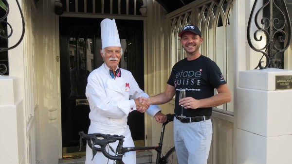 Anton Mosimann and Robert Simpson outside Mosimann's with BMC Bike